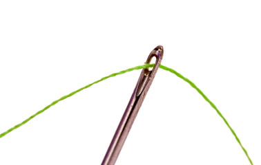 Needle with thread isolated on white