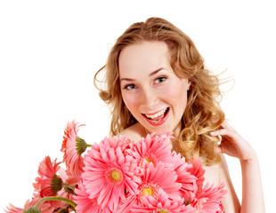 Young woman holding flower.