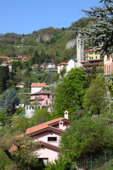 Fototapeta premium tipical italian village with houses standing on a hills.