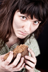beggar woman with a piece of bread