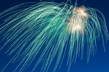 green firework close up