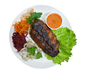 Grilled beef on white plate  with vegetable .