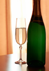Bottle and glass of champagne
