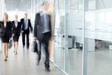 Businesspeople in corridor