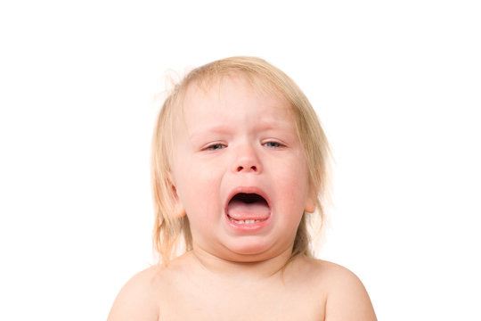 Adorable unsatisfied baby cry screaming on white background