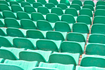 rows plastic seats on arena