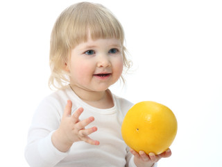 Baby with a ripe fruit