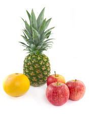 Fototapeta na wymiar Red apples with pineapple and grape