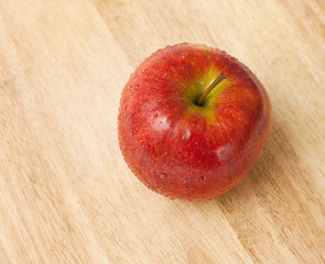 apple on wooden board