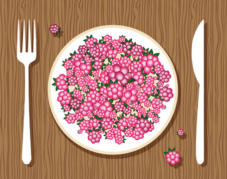 Raspberries on plate with fork and knife on wooden background