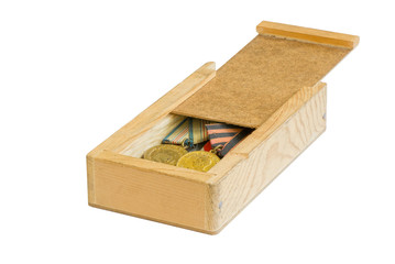 Wooden box with grandpas' medals from the War World II.