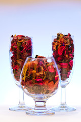 Glass with dried leaves