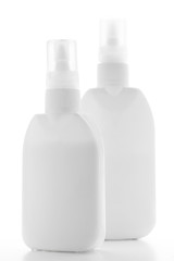 White containers of glue