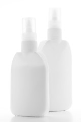 White containers of glue