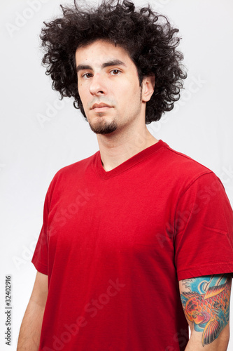 Handsome Young Man With Long Curly Hair Stock Photo And Royalty