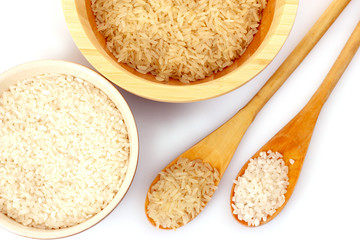 Two kinds of rice in spoons