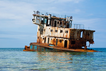 Rusty sunken ship