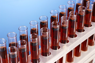 Test tubes closeup on blue background