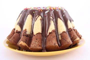 Bundt Cake, covered with chocolate and sprinkles