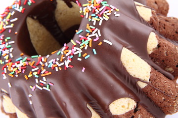 Bundt Cake, covered with chocolate and sprinkles