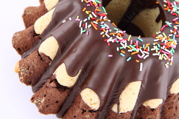 Bundt Cake, covered with chocolate and sprinkles