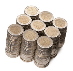 Stacks of 2 Euros Coins in front of white background