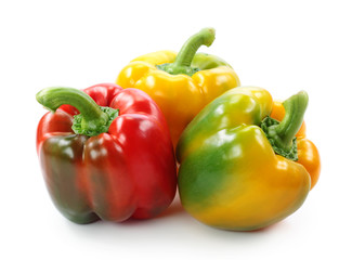 Red, yellow and green paprika on white background