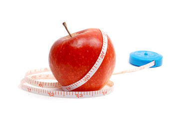 Red fresh apple with tape on white background