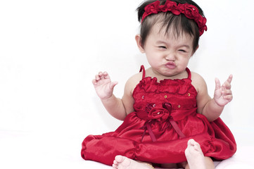 Little baby girl and her funny expression