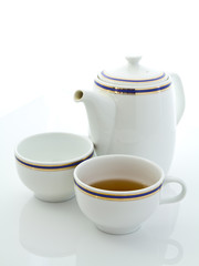 Tea set on the white table