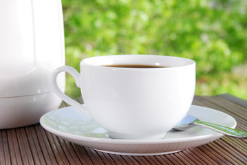 Black coffee served on the patio