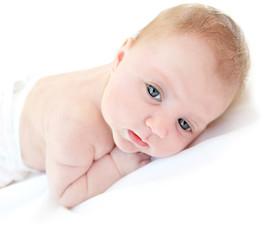 Little baby lying in the bed