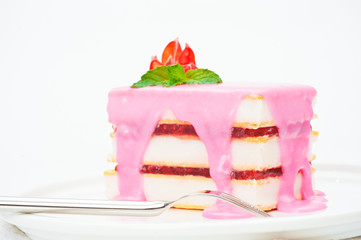 Small cakes with a pink icing