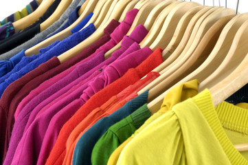 colorful shirt rack on white