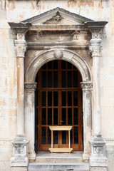 Fototapeta na wymiar Portal of little old church in Dubrovnik