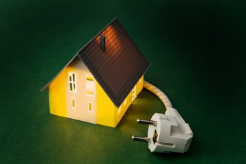 ein Haus mit Stromstecker