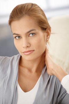 Closeup facial portrait of attractive woman