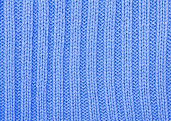 Knitted blue cloth close up, a background