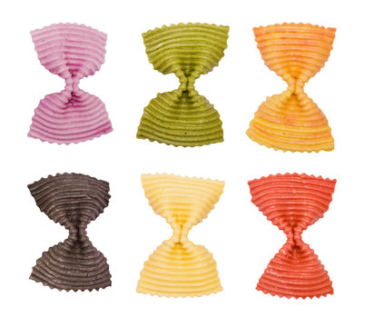 Multi colored pasta on a white background