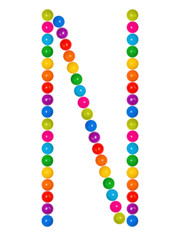 Letter N from plastic children's balls on the white