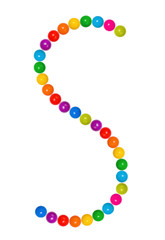 Letter S from plastic children's balls on the white