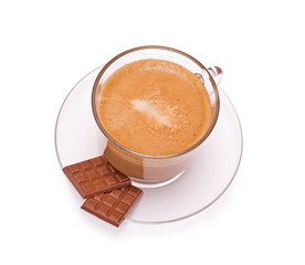 Coffee in a glass cap and chocolate on the white