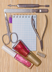 Naklejka premium Accessories to manicure. An empty place for your text.