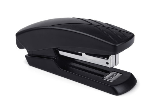 Black office stapler isolated on white