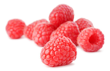 Isolated berries. Raspberry fruits isolated on white background, selective focus