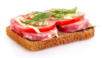 tomatoes and sausage on bread isolated on white
