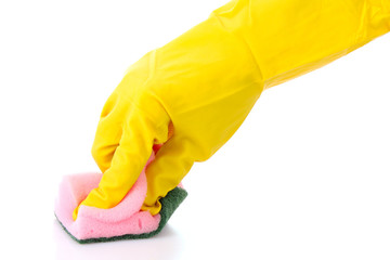 hand wearing a working glove and holding big sponge