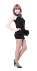 Fototapeta premium charming girl in a black short dress