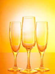 Wine glasses against gradient background
