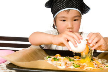 料理をする子供